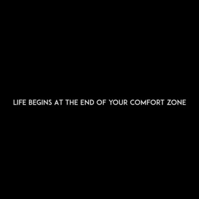 White text on a black background: Life begins at the end of your comfort zone.