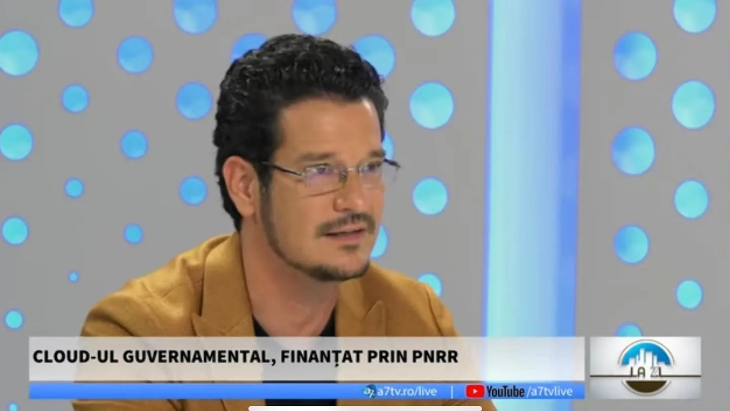 Sebastian Cochinescu discusses government cloud funding during an A7TV broadcast.