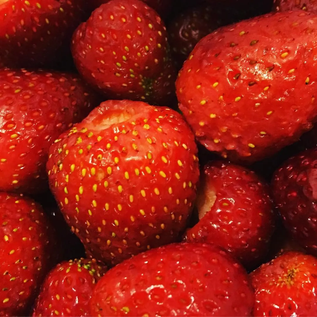 Close-up of fresh red strawberries packed tightly together