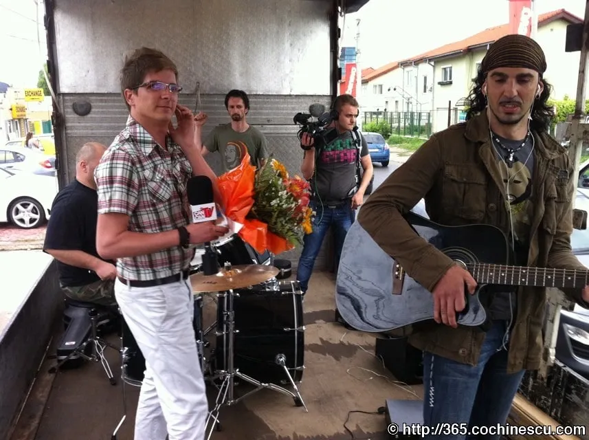 The members of Hara and a TV crew get ready for an outdoor concert.
